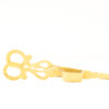 Elegant golden scissors with intricate design, perfect for display or precise cutting.