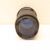 Matte black camera lens highlighting intricate details, perfect for capturing stunning photographs.