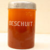 Vintage Amber Beschuit Jar with Aged Metal Lid, a Piece of Dutch Culinary History.