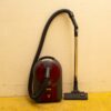 Sleek gray and red vacuum cleaner, ideal for vintage lovers and versatile home cleaning.