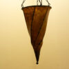 Elegant artisan amber hanging lamp with intricate patterns, perfect for enhancing any decor style.