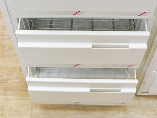 Modern white freezer drawers with stylish organization for efficient food storage and freshness.
