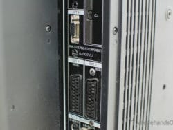 Vintage projector rear panel featuring RGB and audio ports for easy multimedia connectivity.