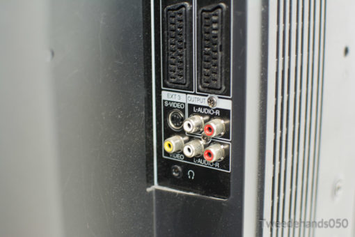 Easily connect your devices with RCA, S-Video, and headphone inputs on this vintage Sharp TV.
