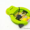 Bright green keychain measuring tape, perfect for precise measurements in any setting.
