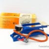 Vintage blue foot pump with orange hose, perfect for inflating bicycles and sports equipment.