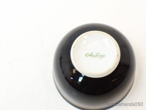Black Arzberg bowl with glossy finish and elegant white interior, perfect for modern decor.