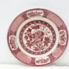 Vibrant red ceramic plate with intricate floral and geometric designs for decorative use.