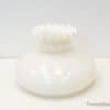 Timeless vintage white vase with a scalloped edge, ideal for elegant floral displays.
