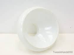 Sleek, glossy white bowl with sculptural design for modern, versatile decor and functional use.