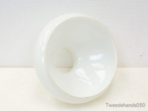 Sleek, glossy white bowl with sculptural design for modern, versatile decor and functional use.