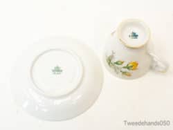 Elegant vintage tea cup and saucer with floral design and gold accents for stylish dining.
