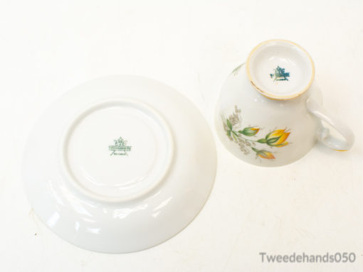 Elegant vintage tea cup and saucer with floral design and gold accents for stylish dining.
