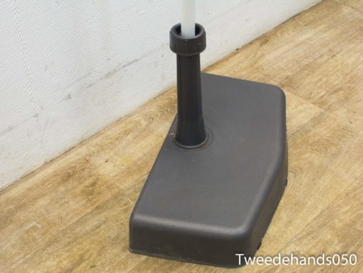 Sturdy black base for flags and umbrellas, ideal for stability in any setting.