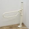 Durable white barrier arm for efficient access control in parking lots and secure areas.