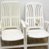 Stylish white lounge chairs for outdoor relaxation in your garden or patio.
