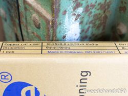 Vintage electrical wiring box with copper specifications, ideal for industrial applications.