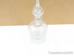 Elegant vintage glass bottle, beautifully crafted for decor or storing precious perfumes.