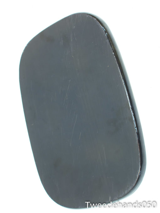 Sleek black decorative stone with rounded corners, perfect for modern minimalist interiors.