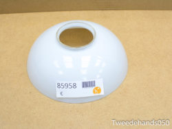 Sleek white ceramic bowl with glossy finish and unique design, perfect for decor or serving.