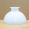 Elegant white porcelain lamp shade enhances contemporary decor with its minimalist design.