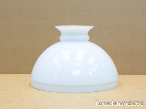 Elegant white porcelain lamp shade enhances contemporary decor with its minimalist design.