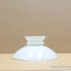 Sleek white vase with sculptural design, perfect for modern decor and floral arrangements.