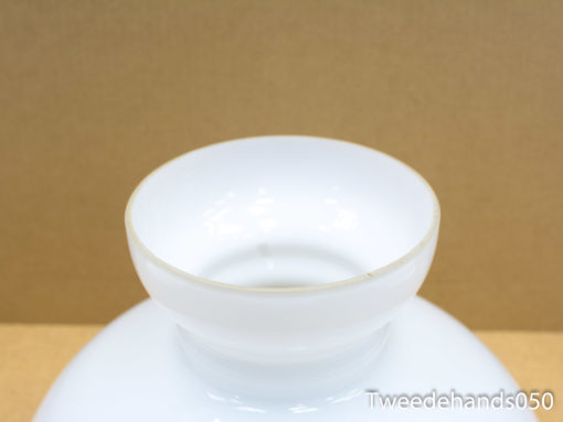 Elegant white vase with gold rim, perfect for stylish decor and floral arrangements.