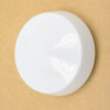 Sleek white circular decor piece, ideal for minimalist spaces and versatile design uses.