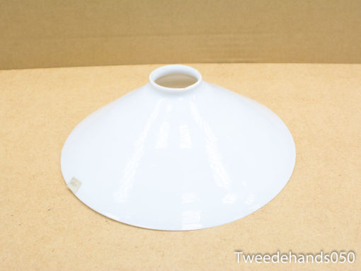 Vintage white conical lampshade for elegant, ambient lighting in any home decor.
