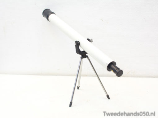 White telescope on sturdy tripod, ideal for beginner stargazers exploring the night sky.
