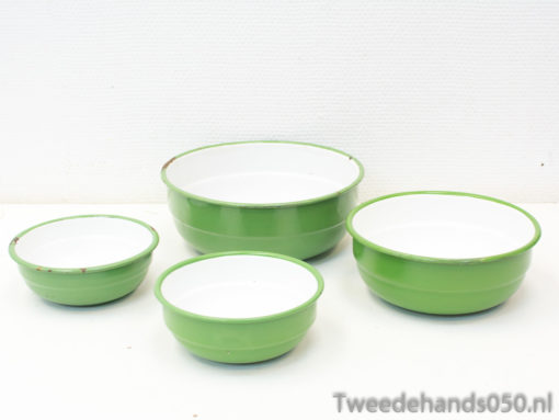 Vintage green bowls with glossy white interiors, ideal for mixing, serving, and nostalgic kitchen decor.