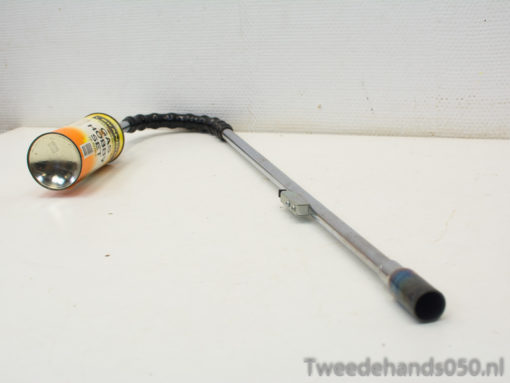 Vintage long-reach gas lighter for safe outdoor grilling and cooking adventures.