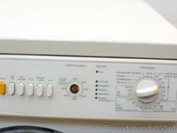 Miele W 729 washing machine control panel: sleek design with intuitive buttons and dial for easy use.