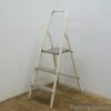 Versatile white three-step ladder for safe home tasks, featuring non-slip steps and easy storage.