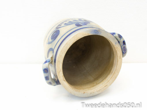Beige ceramic pot with blue floral design and handles, perfect for functional or decorative use.