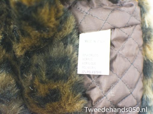Chic leopard print faux fur jacket with quilted lining, crafted in Italy for winter warmth.