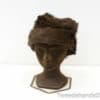 Stylish vintage brown faux fur hat, perfect for warmth and elegance on chilly days.