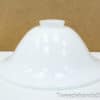 Elegant white cloche for modern dining, ideal for stylish food presentation and decor.