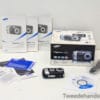 Vintage Samsung Digimax A502 camera with manuals and accessories, ideal for photography collectors.
