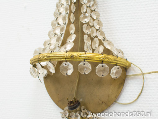 Elegant vintage chandelier with sparkling crystals enhances any interior decor with timeless charm.
