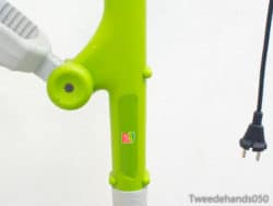 Eco-friendly green trimmer designed for effortless gardening and efficient lawn care.