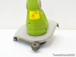 Powerful green planer designed for precision woodwork, suitable for all skill levels.