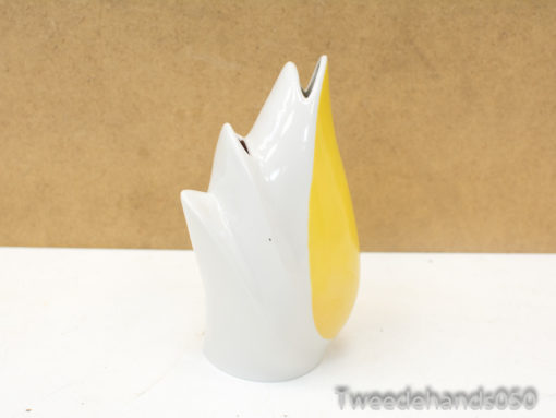 Stylish yellow and white ceramic flame sculpture, ideal for modern decor and artistic accents.