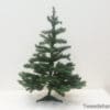 Versatile artificial Christmas tree for joyful holiday decorating and festive tabletop displays.