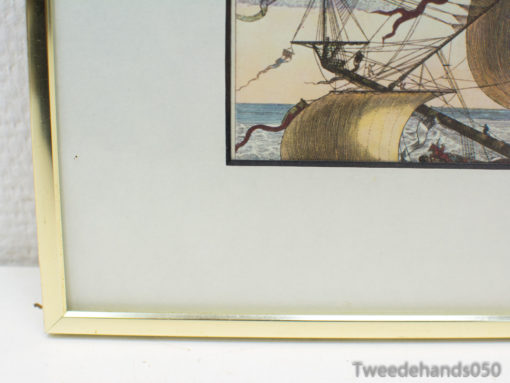 Elegant sailing ship artwork in a gold frame, perfect for nautical decor enthusiasts.
