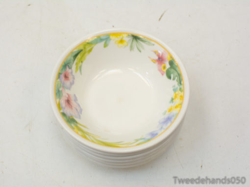 Elegant porcelain bowl with pastel floral design, ideal for sauces, dips, or decorative use.