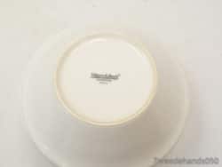 Elegant glossy ceramic bowl with gold rim by Villiers & Boon for sophisticated dining settings.