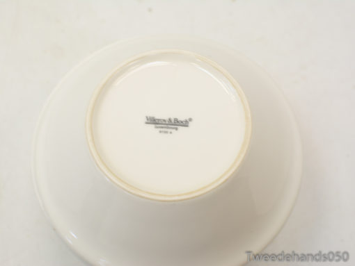Elegant glossy ceramic bowl with gold rim by Villiers & Boon for sophisticated dining settings.