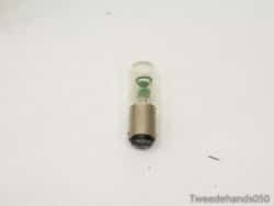 Vintage vacuum tube with clear glass design and green element, ideal for collectors.